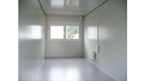 Bürocontainer isoliert, 6055 x 2435 x 2600 mm (L x B x H),  inkl. Elektropaket, 2 Fenster, Lackierung RAL 1003 signalgelb - Variante 3